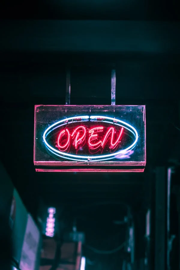 Neon open for business sign